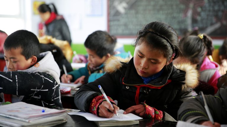 students with coats