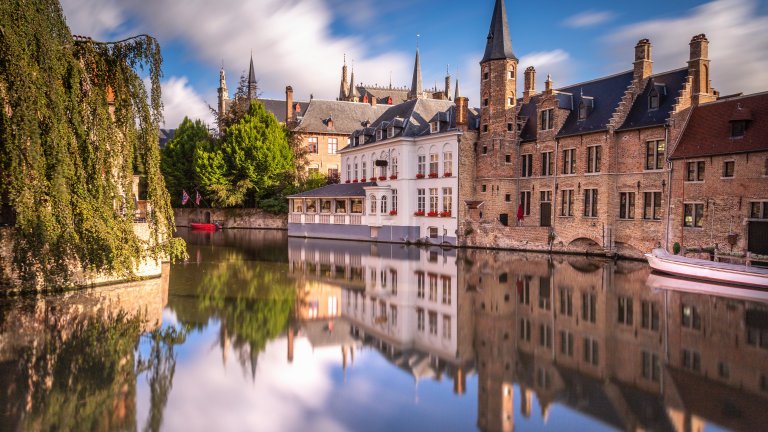 Long exposure Idyllic blurred Rozenhoedkaai at sunrise – Bruges medieval old town - Belgium